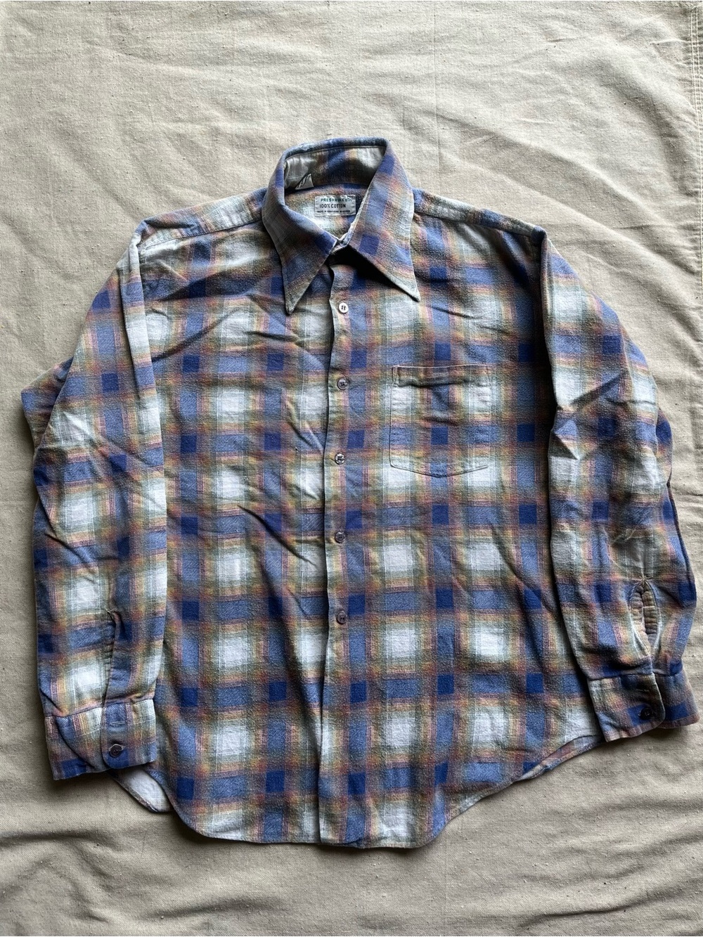 Vintage Preshrunk 100% Cotton flannel shirt in a faded blue, cream plaid. L